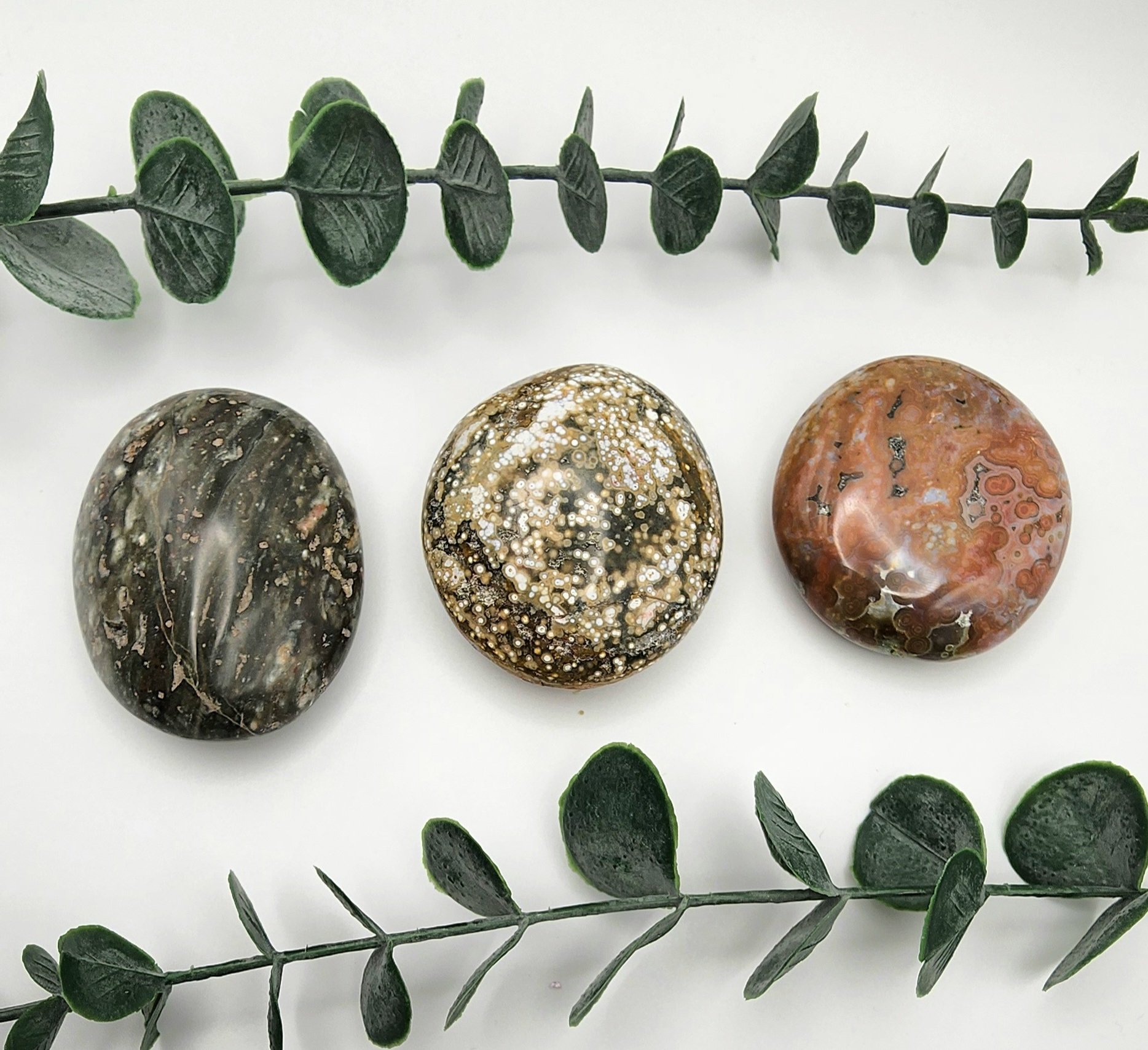 Orbital Jasper Palm Stones